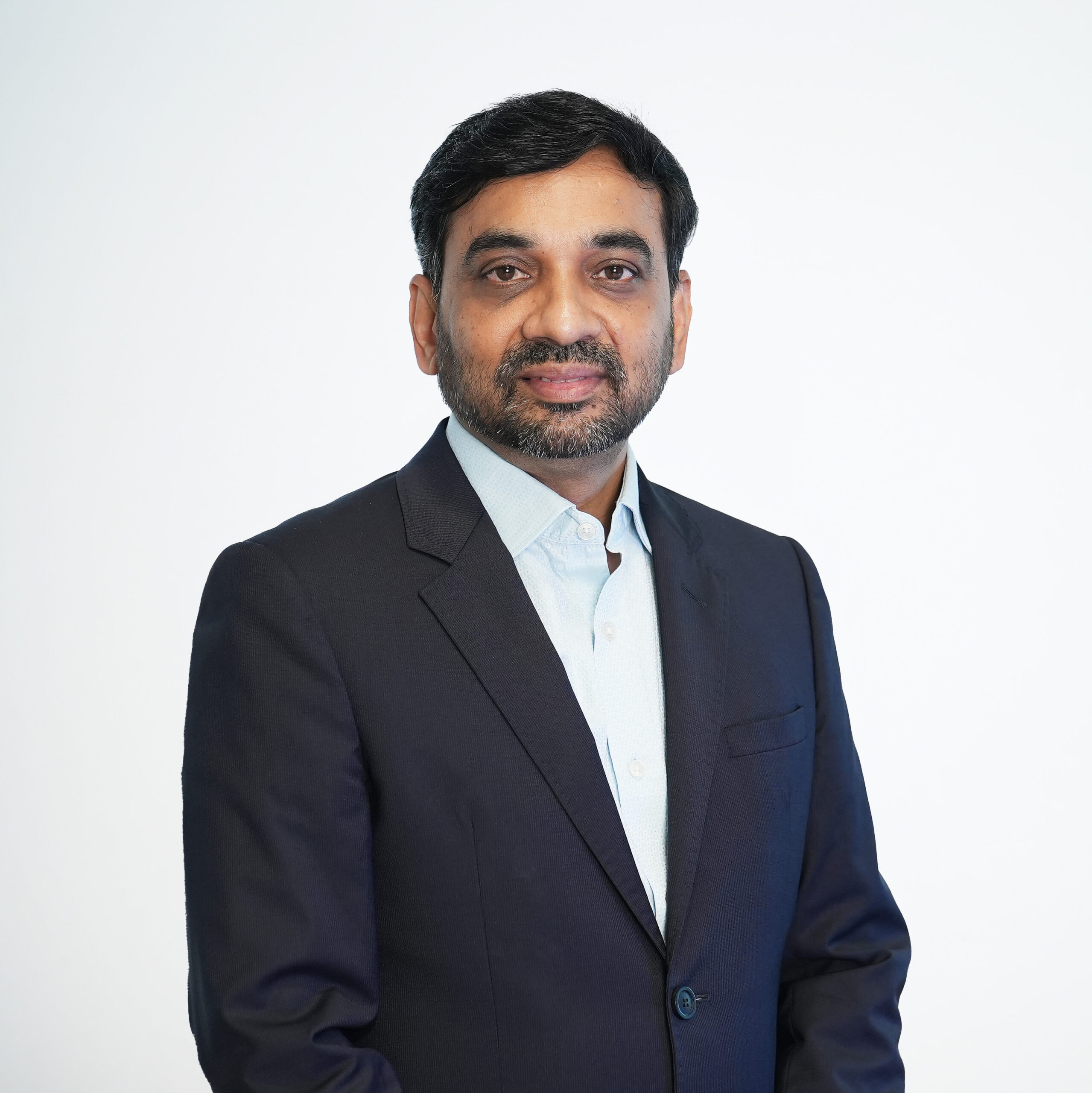 Portrait of Mahesh Babu, Managing Director, Olectra